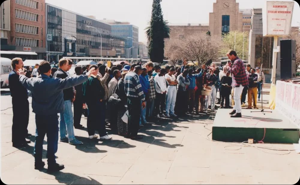 pastor preaching in hoffman square